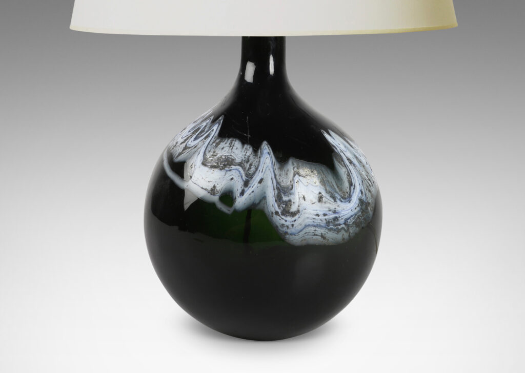 Gallery BAC organically modeled form in green-black with wavy nacreous collar; hand-blown glass