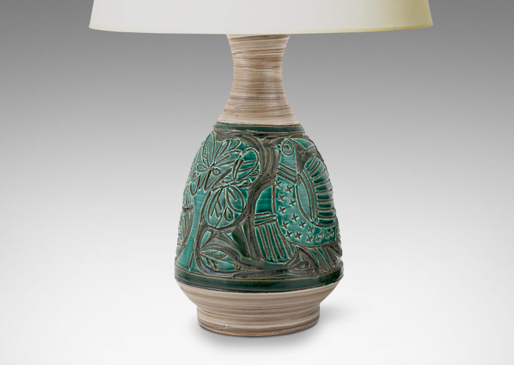 Gallery BAC angled decanter-like forms with carved reliefs depicting birds and trees, in shiny saturated jade green and matte striae pale taupe