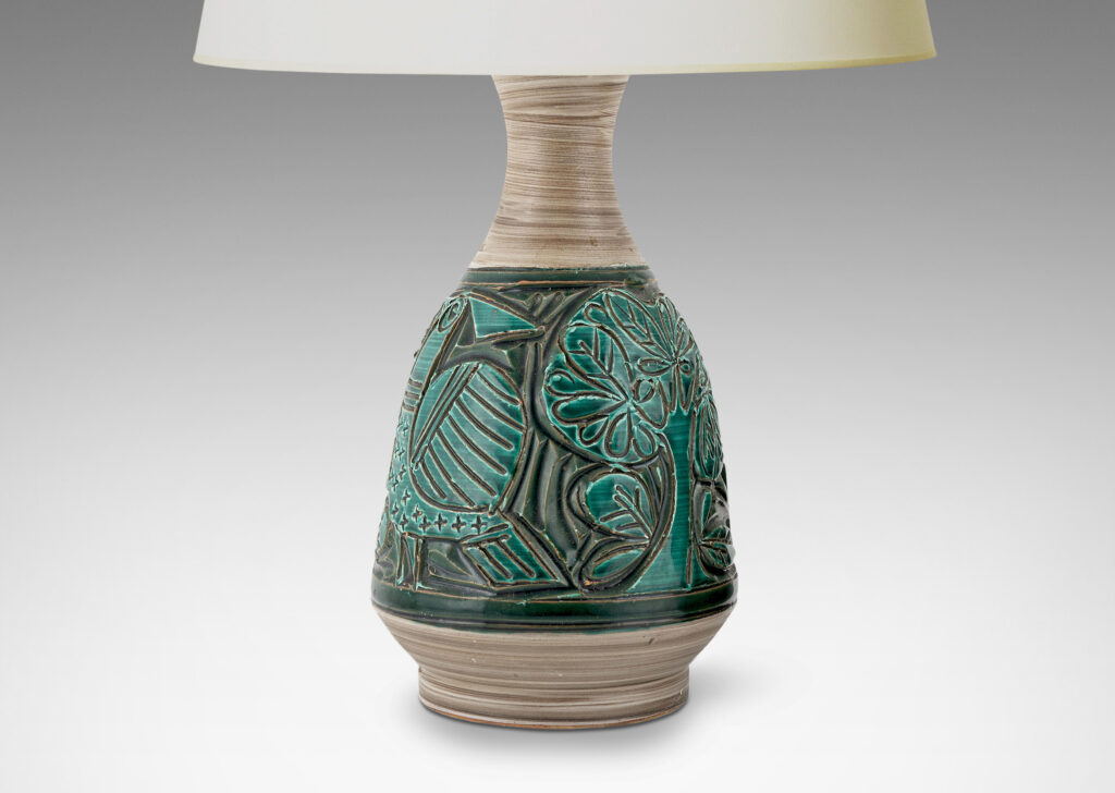 Gallery BAC angled decanter-like forms with carved reliefs depicting birds and trees, in shiny saturated jade green and matte striae pale taupe