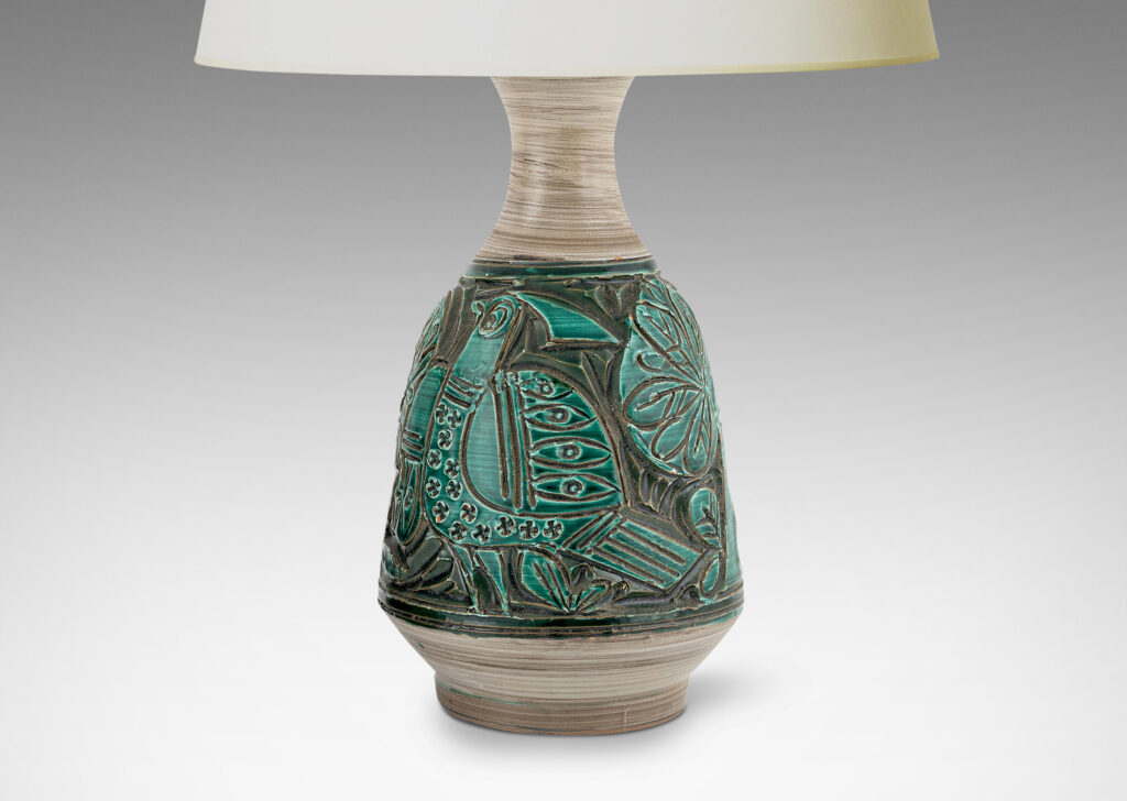 Gallery BAC angled decanter-like forms with carved reliefs depicting birds and trees, in shiny saturated jade green and matte striae pale taupe