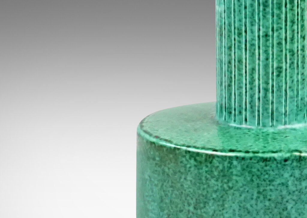 Gallery BAC rationalized ewer form with sponged blue-green copper oxide glaze