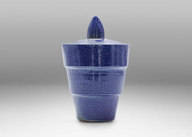 Gallery BAC tiered lens form and leaf-shaped finial, glazed in a handsome lapis tone blue