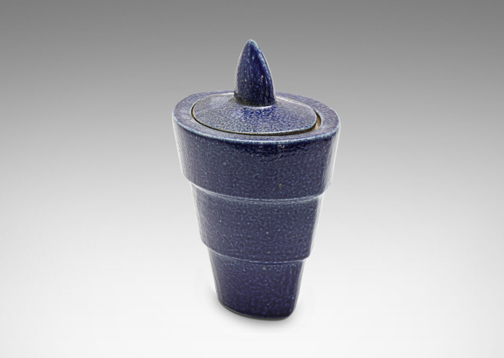 Gallery BAC tiered lens form and leaf-shaped finial, glazed in a handsome lapis tone blue