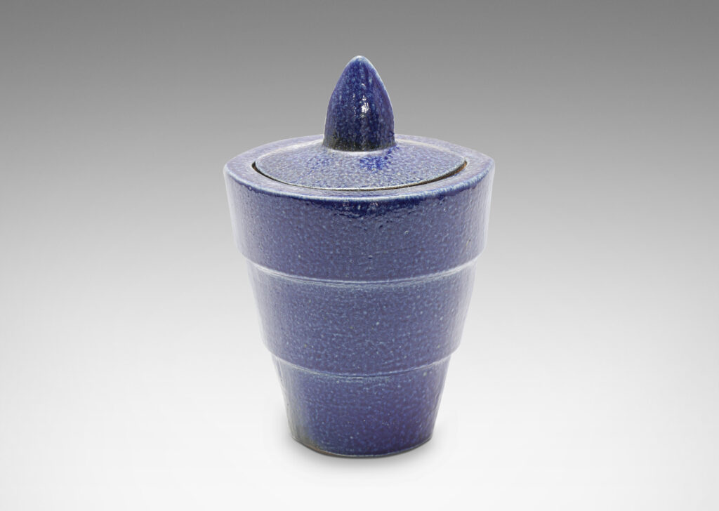 Gallery BAC tiered lens form and leaf-shaped finial, glazed in a handsome lapis tone blue