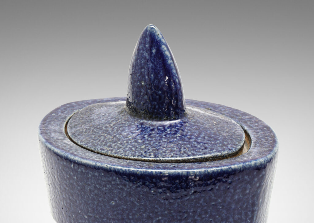 Gallery BAC tiered lens form and leaf-shaped finial, glazed in a handsome lapis tone blue