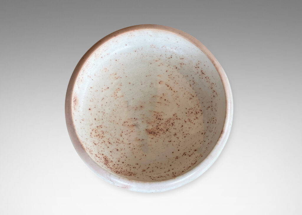 Gallery BAC considered organically modeled form in ivory with buff tones and brown speckling