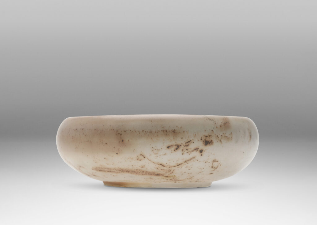 Gallery BAC considered organically modeled form in ivory with buff tones and brown speckling