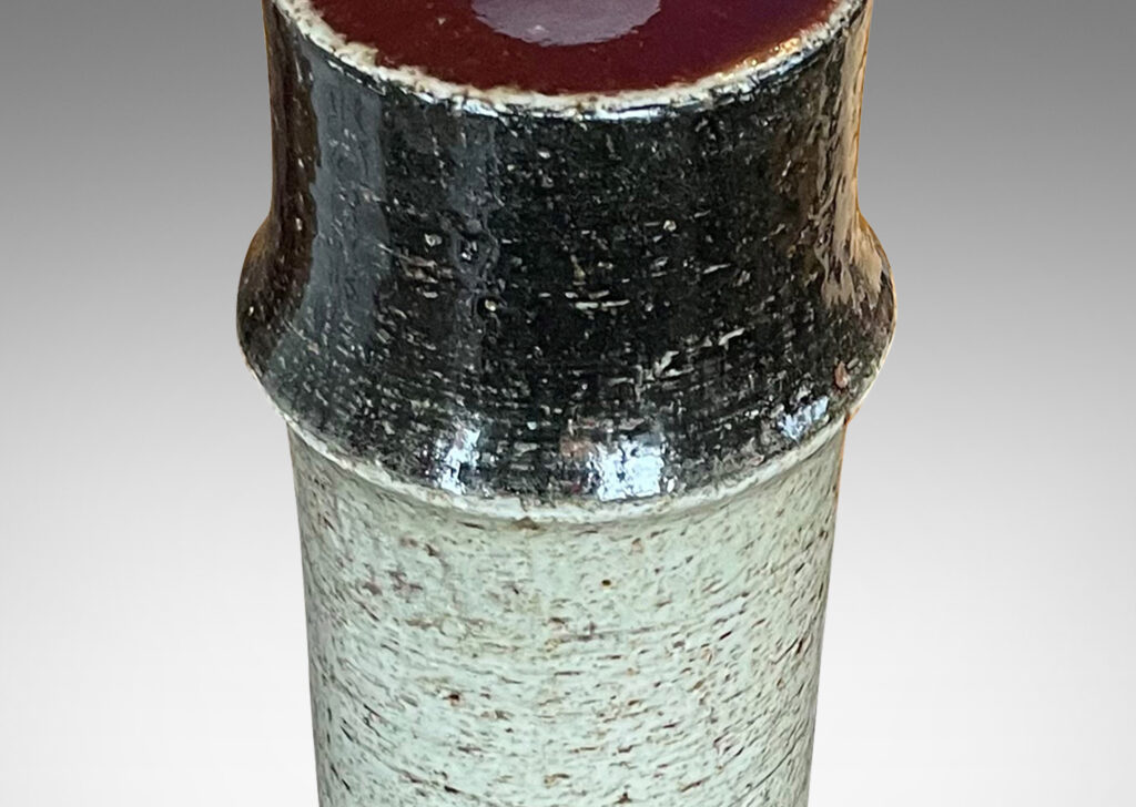 Gallery BAC notched cylindrical form with wonderful grog clay texture in clear pale green-gray, black and burgundy