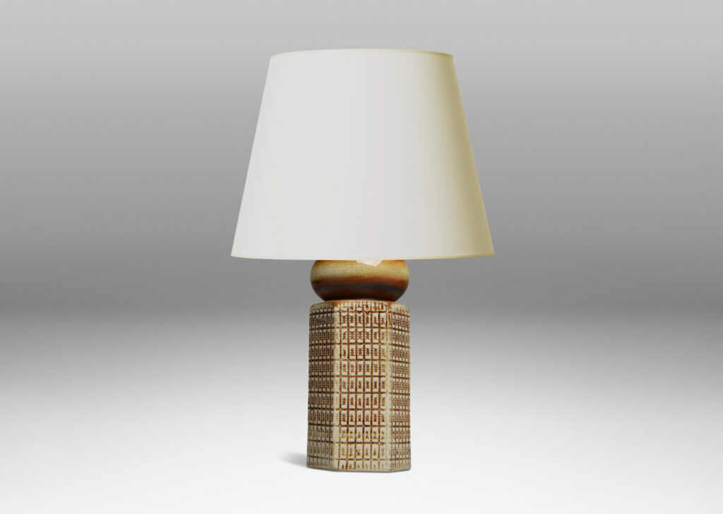 Gallery BAC hexagonal form ornamented with a gridded pattern, topped with a bulb-form cap glazed in warm brown over ivory