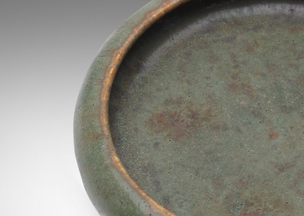 Gallery BAC softly modeled inwardly curved sides in a mottled gray-brown and green-blue glaze