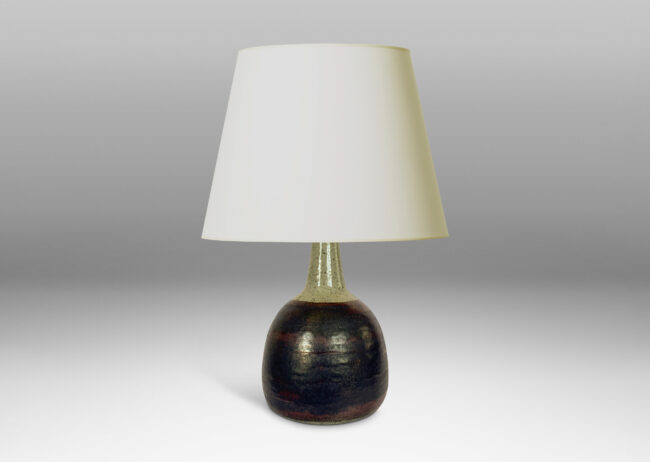 Gallery BAC bulbous form with tall, conical neck, glazed in a black and burgundy luster and speckled gray