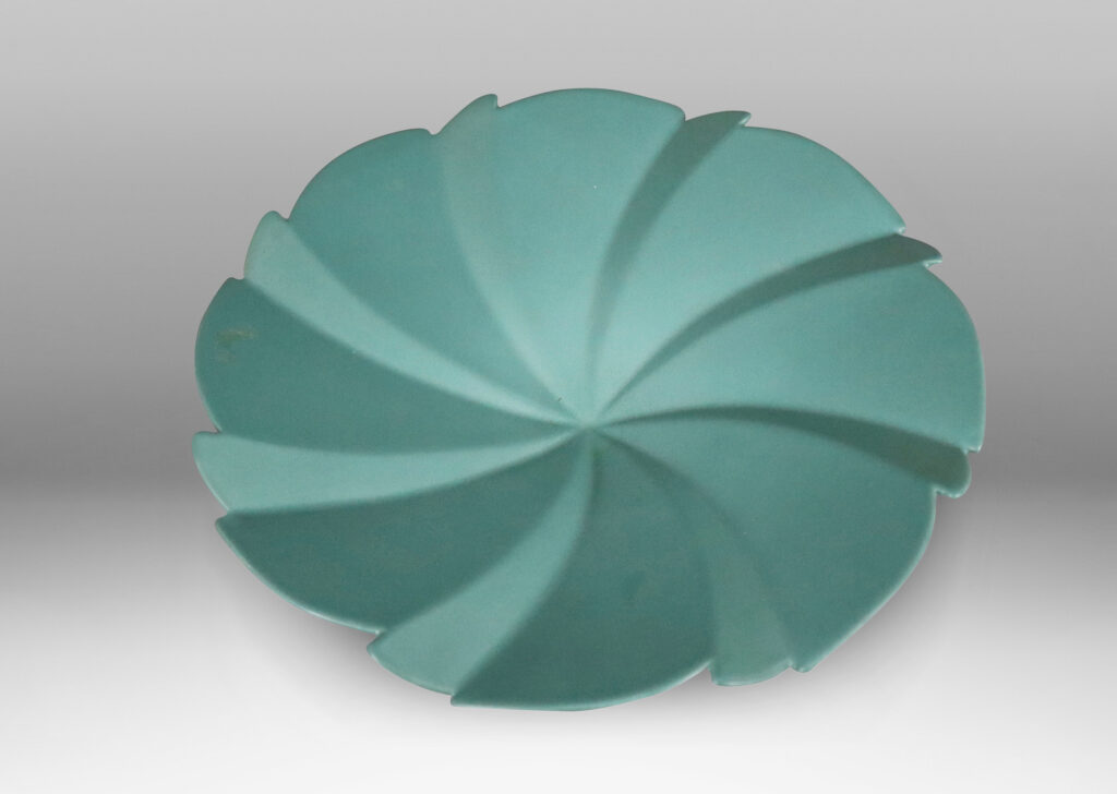 Gallery BAC pinwheeling folded form with scallop edge in a gray-turquoise glaze