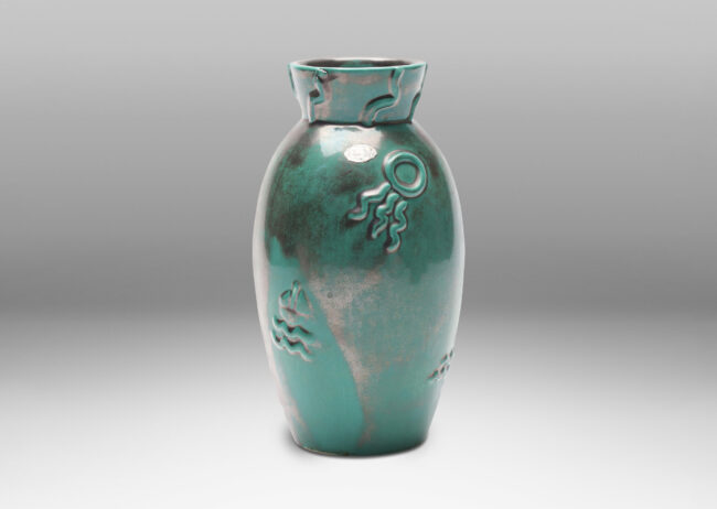 Gallery BAC tall ovoid form with flared mouth, ornamented with wave, sun and boat motifs,