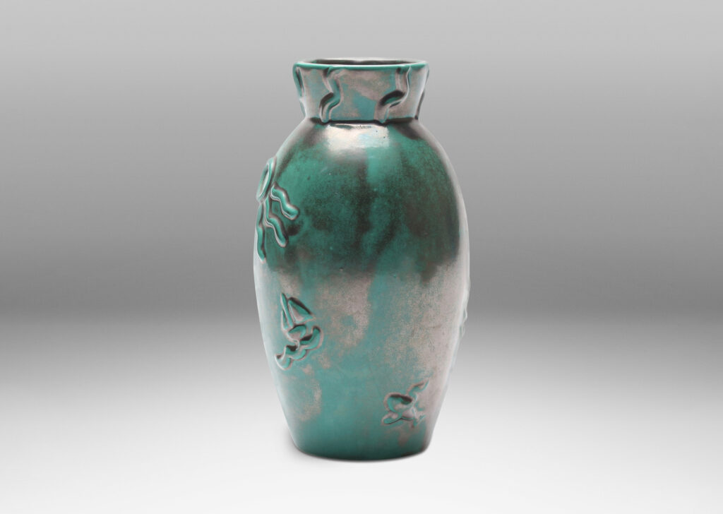 Gallery BAC tall ovoid form with flared mouth, ornamented with wave, sun and boat motifs,