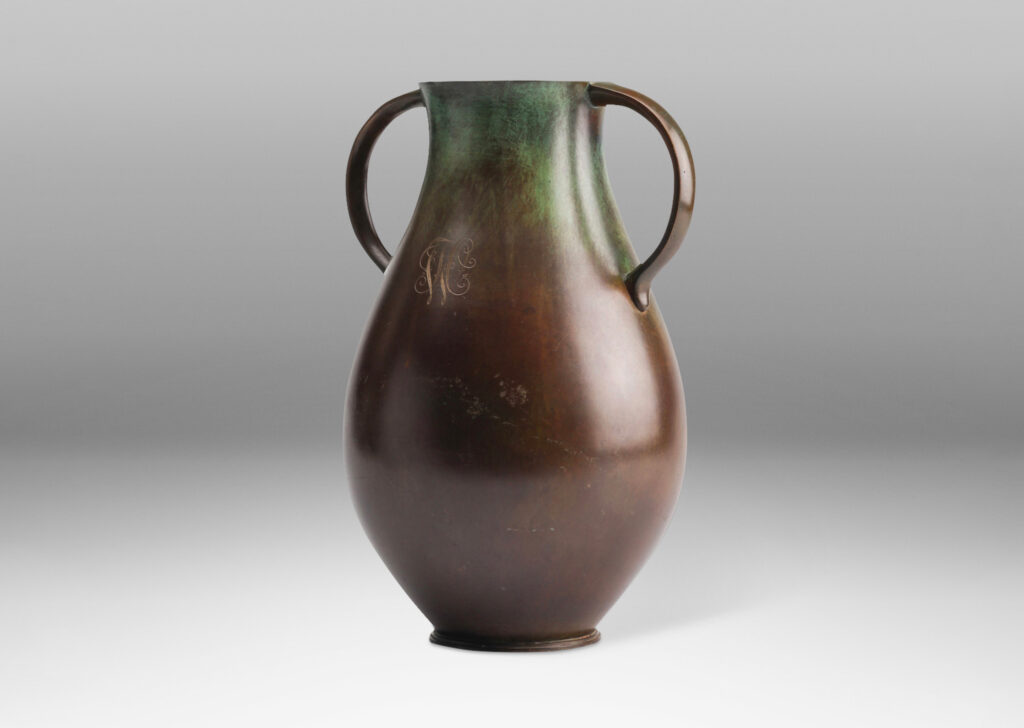 Gallery BAC swelling form with sinuously modeled handles; patinated bronze