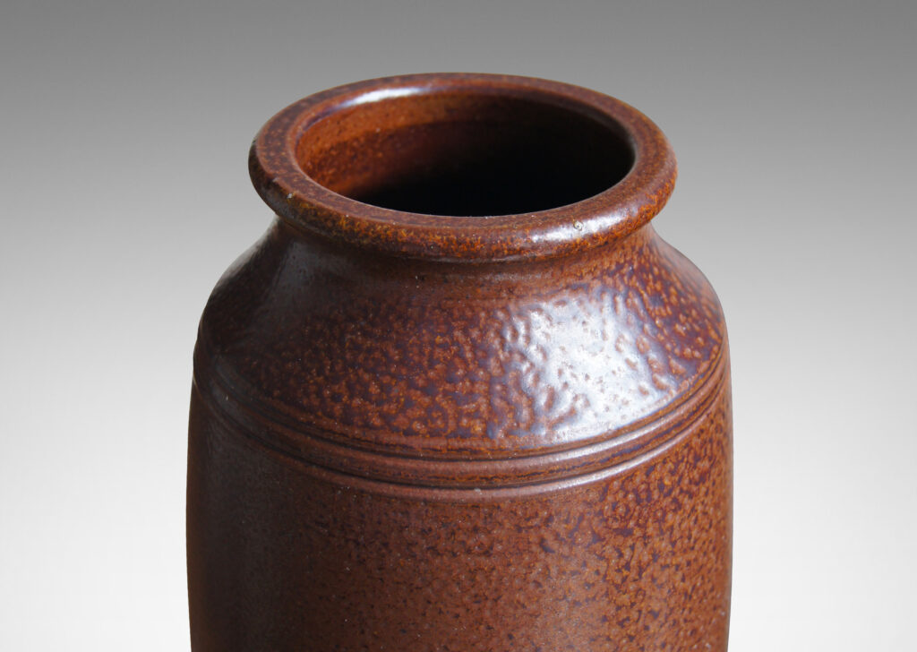 Gallery BAC large raked form in a butter dark brown glaze with orange peel-like surface texture