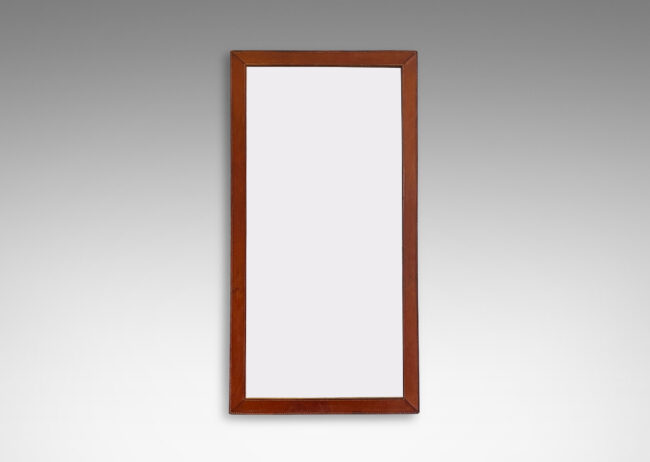 Gallery BAC frame of stitched stacked leather around a tall rectangular looking glass