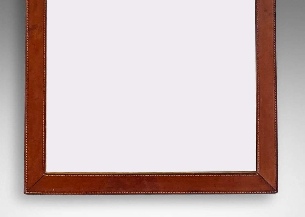 Gallery BAC frame of stitched stacked leather around a tall rectangular looking glass