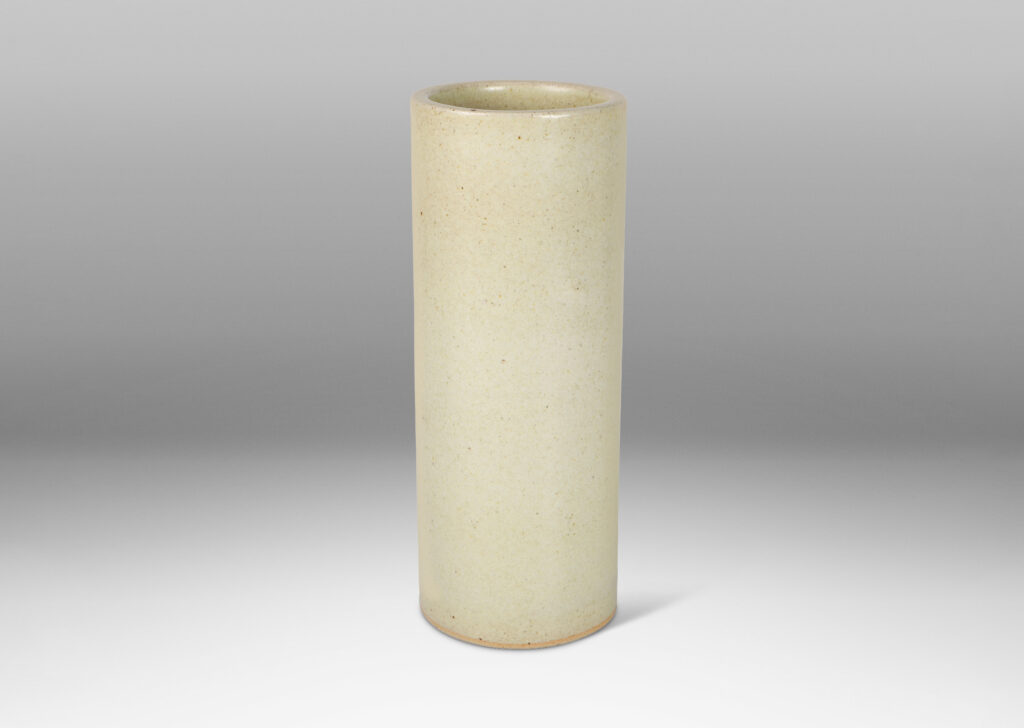 Gallery BAC tall cylindrical form decorated with carved constellation of circles in pale greige