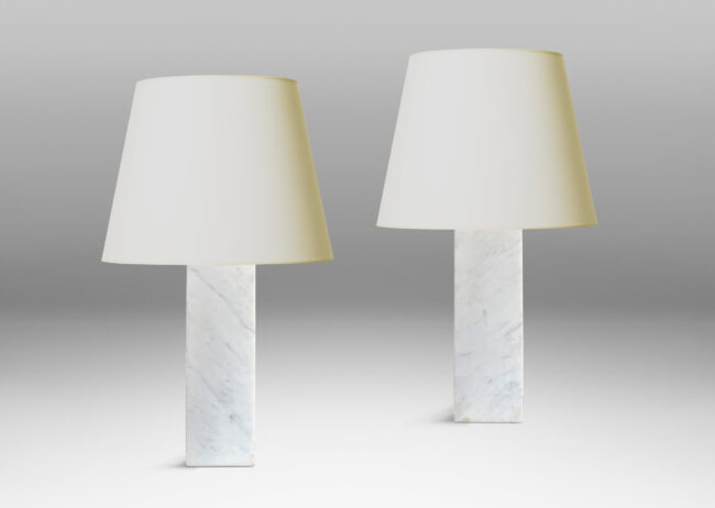 Gallery BAC muscular pedestal forms in solid white marble with light gray veining