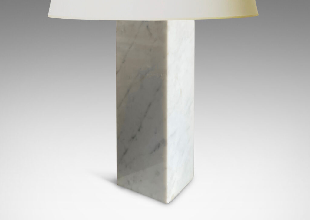 Gallery BAC muscular pedestal forms in solid white marble with light gray veining