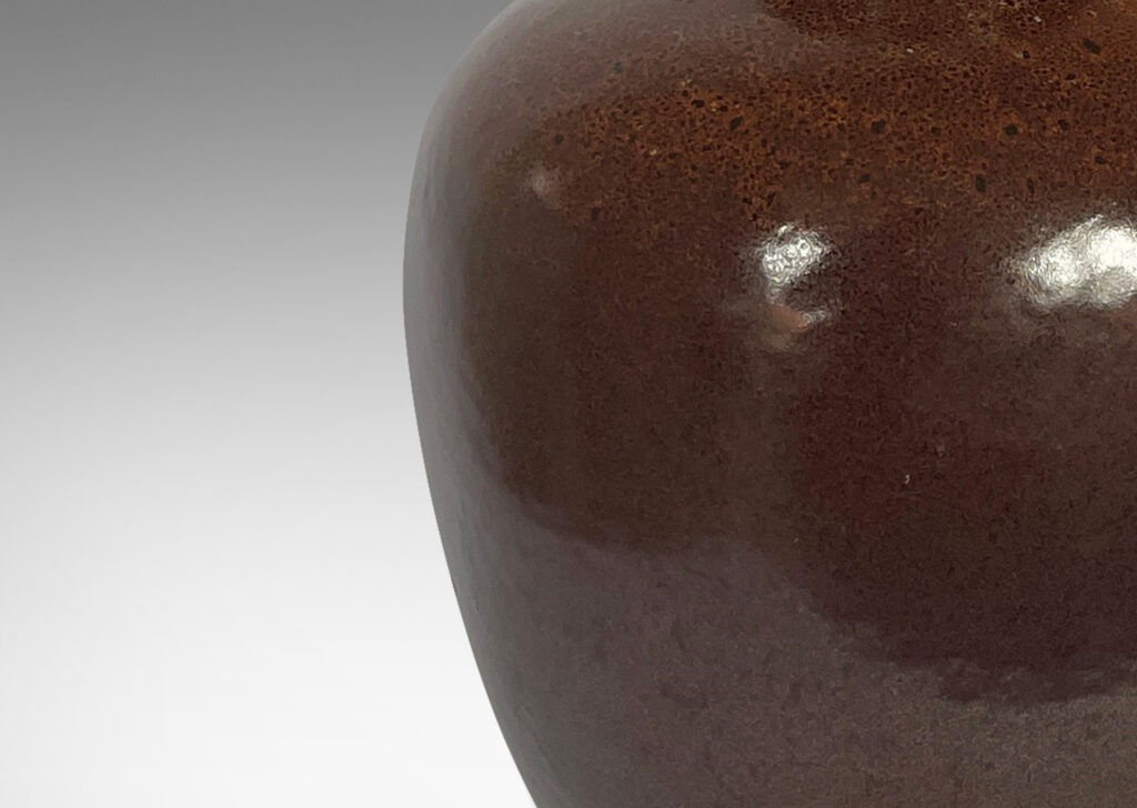 Gallery BAC tapered jug-like form with a wide neck in a saturated brown attractively constellated around the shoulder