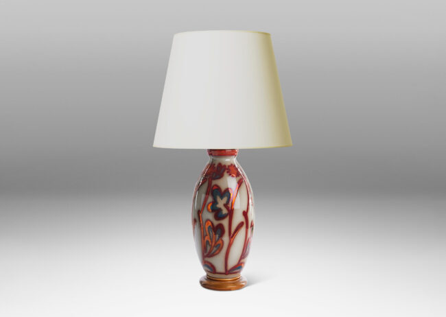 Gallery BAC swelling column form exuberantly painted with a stylized flora design in red luster on a pale gray field