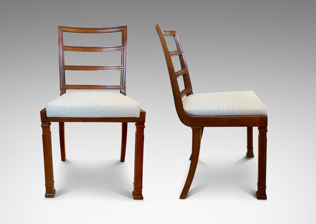 Gallery BAC slightly cantilevered seats, gently curved ladder backs, fluted pillar front legs and sabered back legs