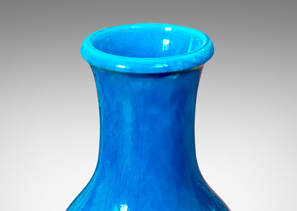 Gallery BAC crafted in earthenware with a saturated turquoise glaze with elegantly subtle craquelure texture