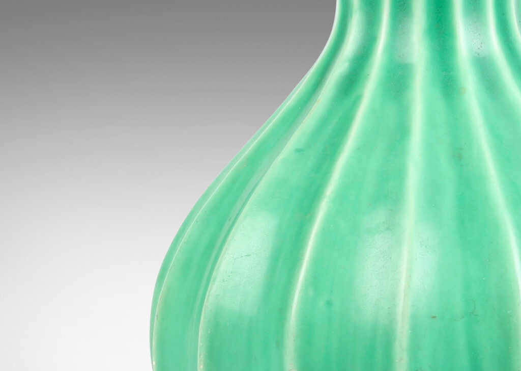 Gallery BAC fluted bulbous form with flared mouth in celadon glaze