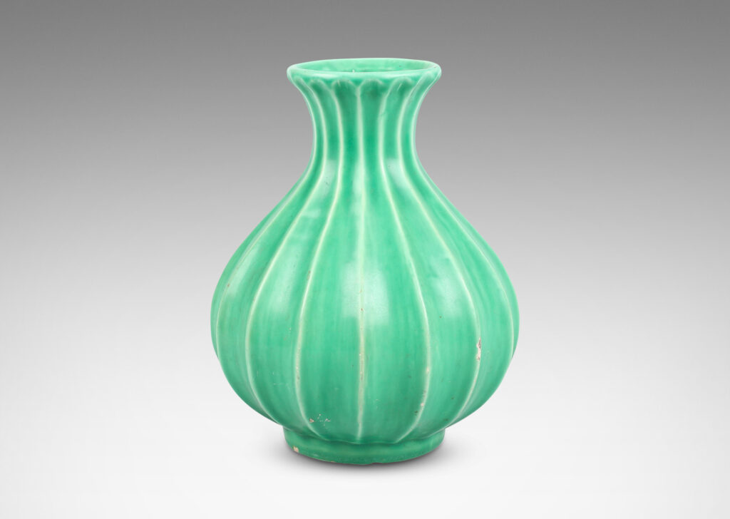 Gallery BAC fluted bulbous form with flared mouth in celadon glaze