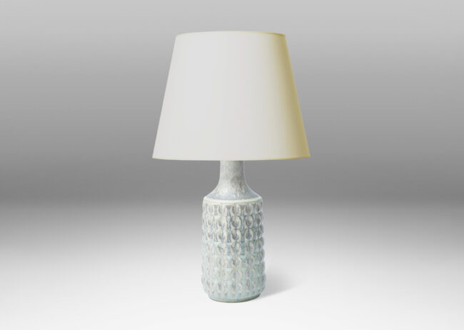 Gallery BAC bottle-like form with pillowy grid relief, glazed in a cool pale gray with warm gray circle pattern