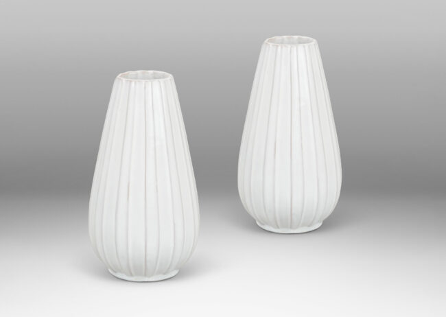 Gallery BAC tall spear forms with fluted sides and a shiny white glaze