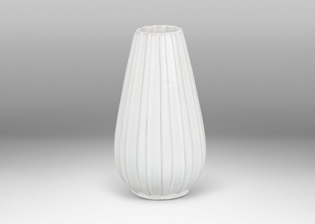 Gallery BAC tall spear forms with fluted sides and a shiny white glaze