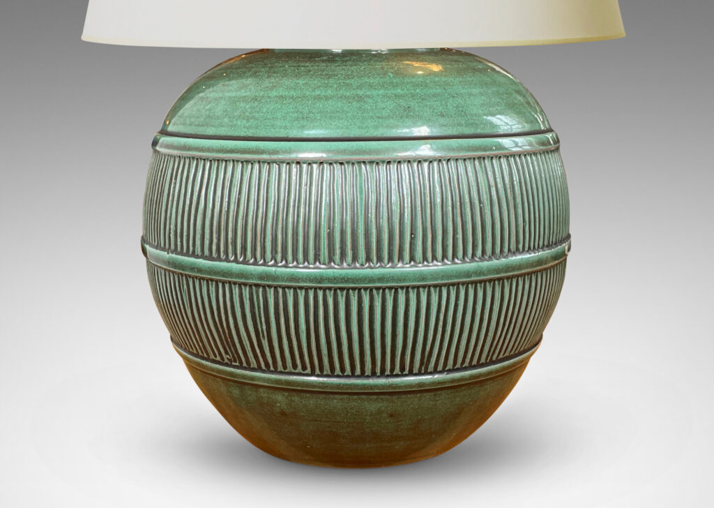 Gallery BAC tapered globe form with wide reeded relief band, earthenware with a tonal green glaze