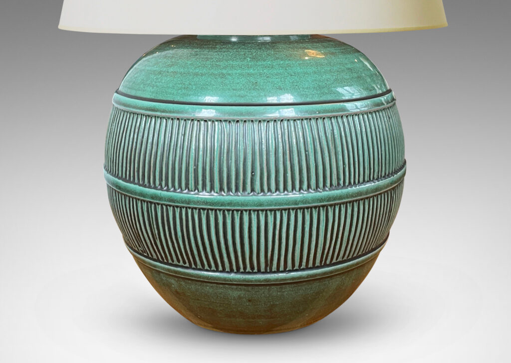 Gallery BAC tapered globe form with wide reeded relief band, earthenware with a tonal green glaze