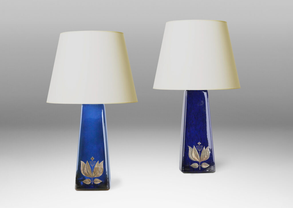 Gallery BAC tall angled pedestal forms with lustrous blue glazing and inlaid silver floral motifs