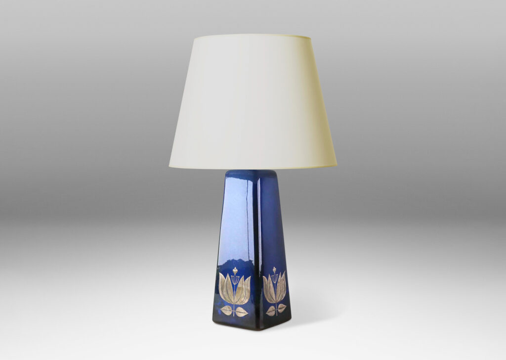 Gallery BAC tall angled pedestal forms with lustrous blue glazing and inlaid silver floral motifs