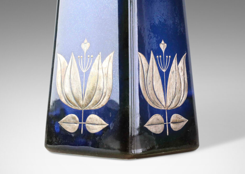 Gallery BAC tall angled pedestal forms with lustrous blue glazing and inlaid silver floral motifs