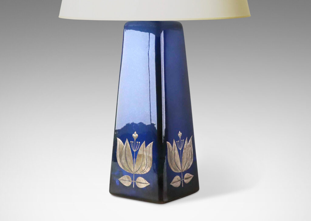 Gallery BAC tall angled pedestal forms with lustrous blue glazing and inlaid silver floral motifs