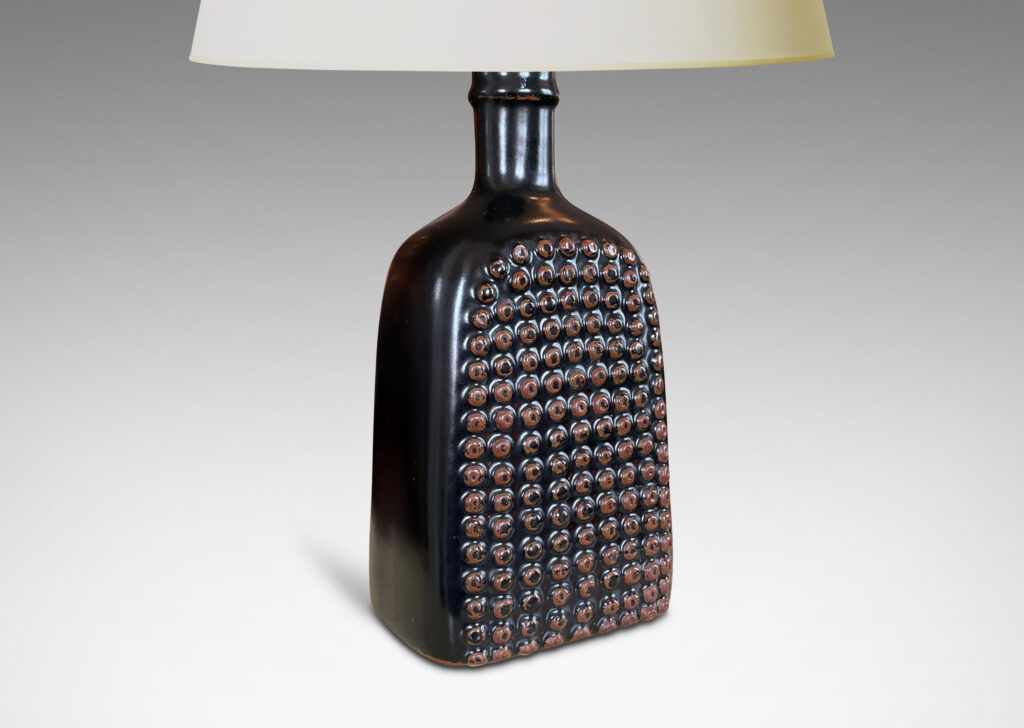 Gallery BAC squared bottle-like form with a grid of cleats on two sides in a chocolate brown glaze