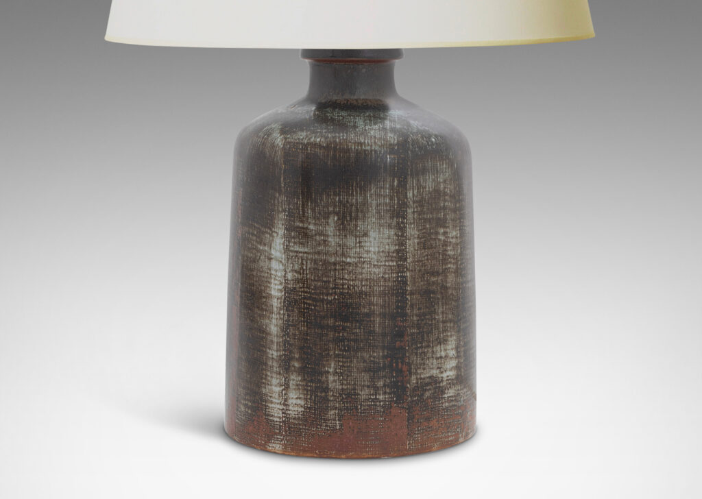 Gallery BAC cylindrical bell form in stoneware with a dry brushed black over green-tinted gray with touches of red luster