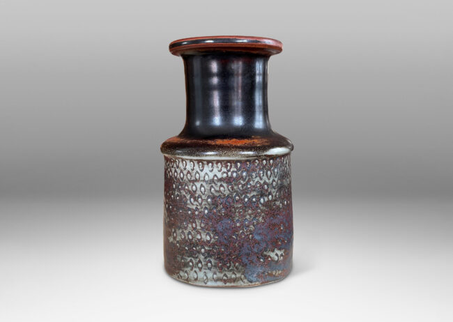 Gallery BAC bottle-like form with wide neck and textured body in gray, black and rust toned glazes