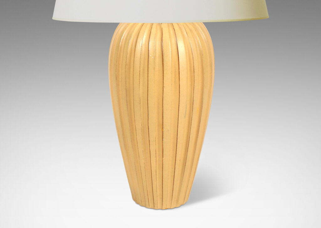 Gallery BAC tall tapered form with carved ribs glazed in a butterscotch tan tone