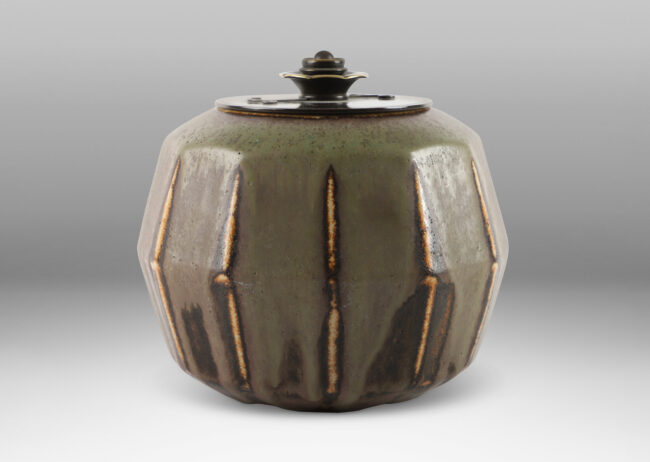 Gallery BAC unique faceted form in stoneware with a magnificently fired flowing olive and brown glaze