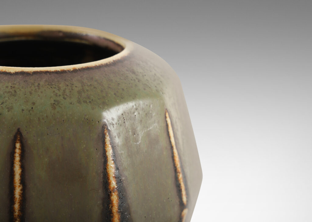 Gallery BAC unique faceted form in stoneware with a magnificently fired flowing olive and brown glaze