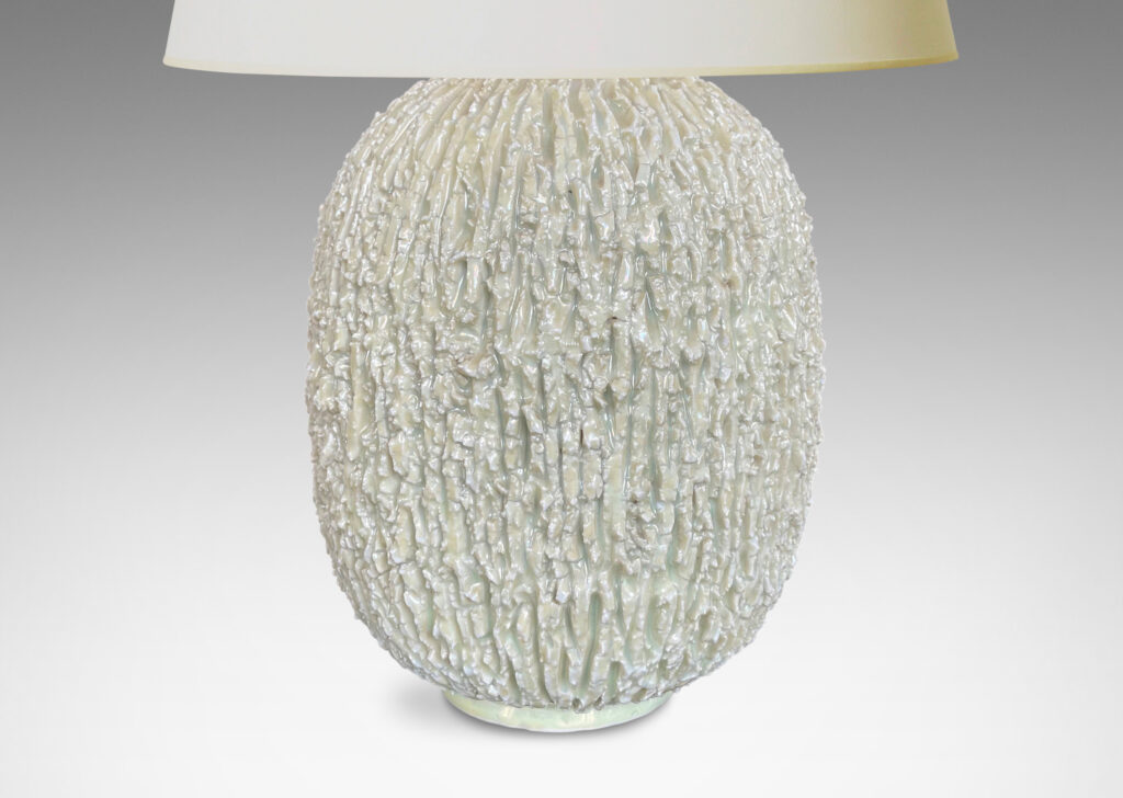 Gallery BAC upright oval form with raked texture and glazed in a very pale lettuce green