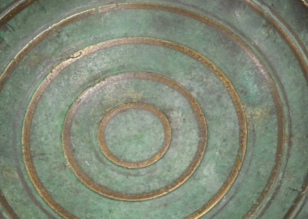 Gallery BAC shallow bowl with handles in verdigris patinated bronze with raised and burnished concentric circles and handle details