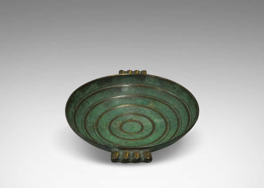 Gallery BAC shallow bowl with handles in verdigris patinated bronze with raised and burnished concentric circles and handle details