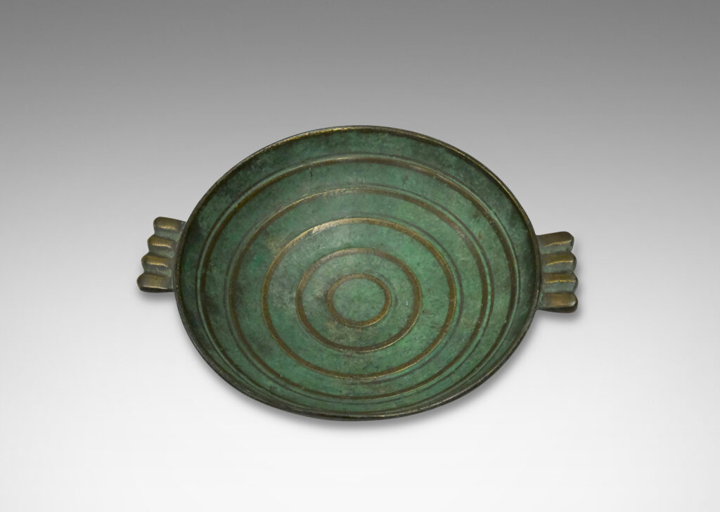 Gallery BAC shallow bowl with handles in verdigris patinated bronze with raised and burnished concentric circles and handle details